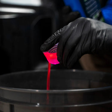 Bersolwax. Fra-Ber. Ceramic car shampoo 1000ml bottle- poured in a bucket